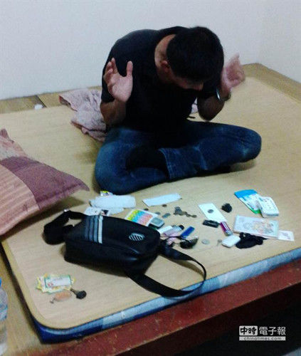 窃贼偷累睡被害人家警察赶到时惊醒（图）