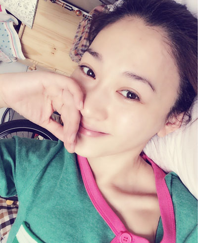 李小冉夫妇现身机场　被曝赴布鲁塞尔移民