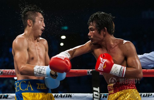 邹市明浴血完胜泰国拳王 眉骨被撞鲜血直流【组图】