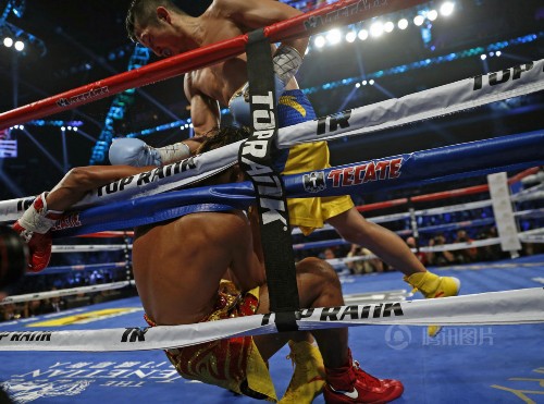 邹市明浴血完胜泰国拳王 眉骨被撞鲜血直流【组图】