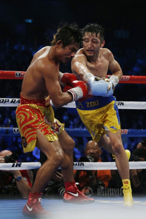 邹市明浴血完胜泰国拳王 眉骨被撞鲜血直流【组图】